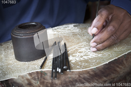 Image of Traditional craftsman carving wood