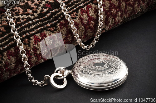 Image of Closed silver pocket watch
