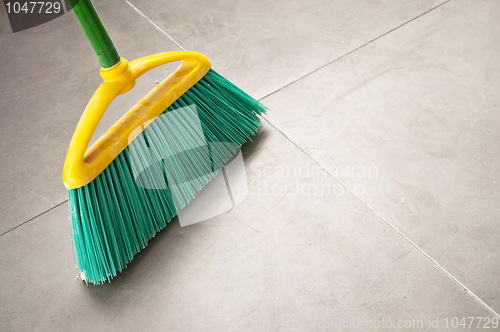 Image of Green plastic broom