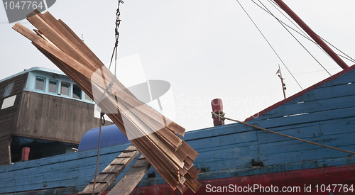 Image of Cargo ship loading goods