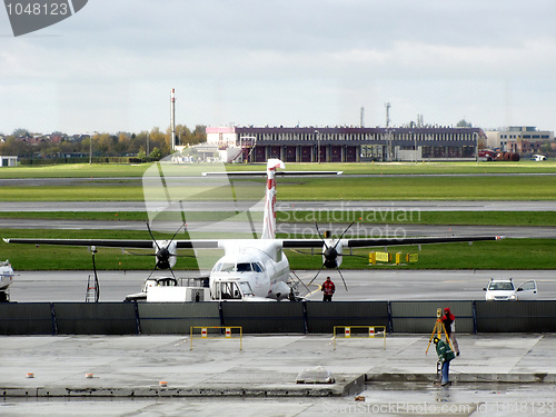 Image of small plane in airport