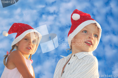 Image of Christmas children agaist the blue sky