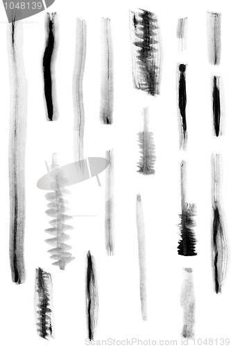 Image of black paint brush marks