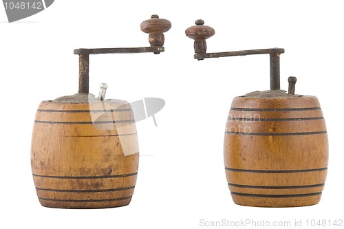 Image of two vintage brown grinder, wooden made