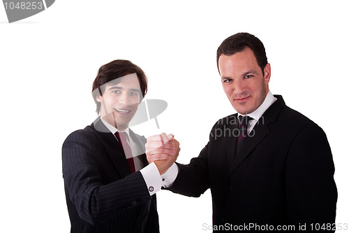 Image of handshake between two businessmen smilling