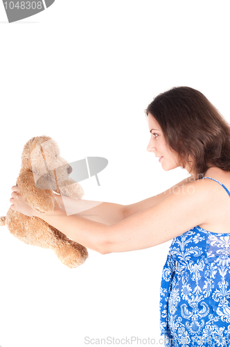 Image of Portrait of pretty pregnant woman with toy