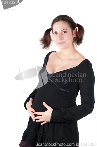 Image of Portrait of pretty pregnant woman in black dress