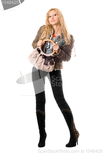 Image of Sexy young blonde with a handbag. Isolated