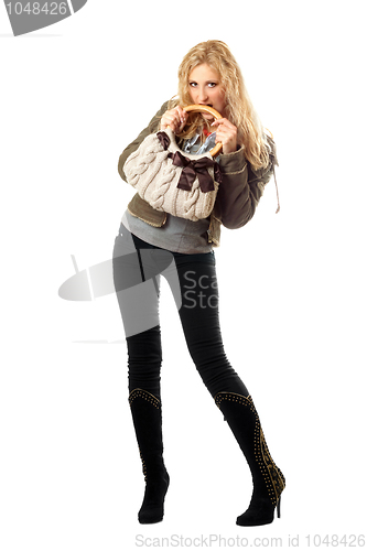 Image of Pretty young blonde with a handbag. Isolated