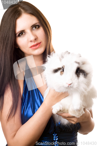 Image of Young woman in blue dress