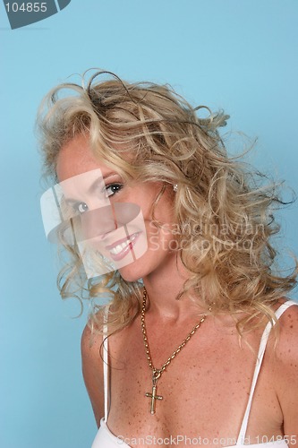 Image of Blond model isolated on blue