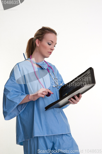 Image of young doctor or nurse on white