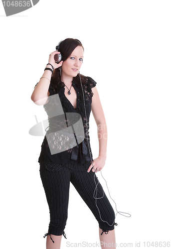 Image of young woman listening headphones