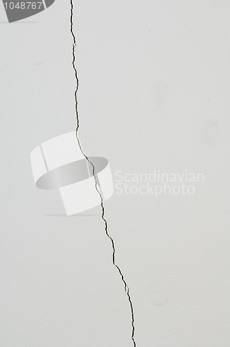 Image of White wall with crack