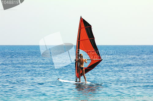 Image of windsurf - surfer girl