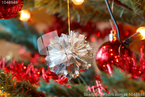 Image of closeup detail of Christmas decoration on tree 