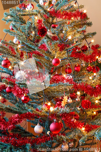 Image of Christmas decoration on tree with light
