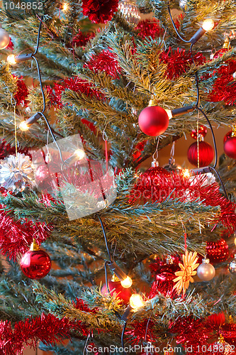 Image of Christmas decoration on tree with light