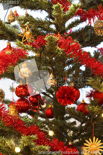 Image of Christmas decoration on tree with light
