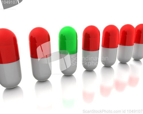 Image of Green pill among reds 