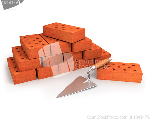 Image of Trowel and stack of bricks isolated on white 