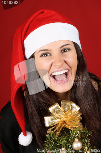 Image of Santa Claus girl with Christmas tree