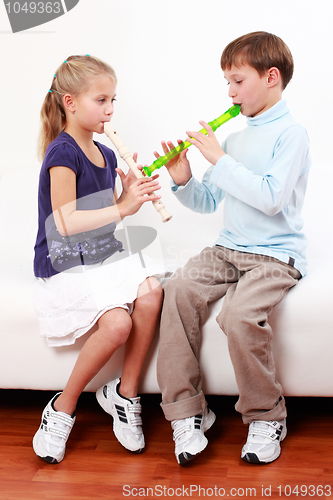 Image of Kids playing flute