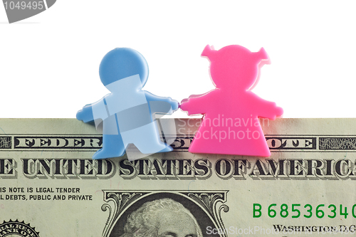 Image of Couple figurine on US dollar note