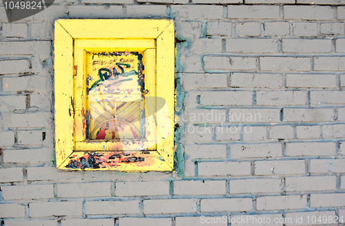 Image of White brick wall with old window