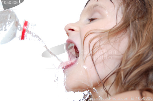 Image of thirsty child drinking water