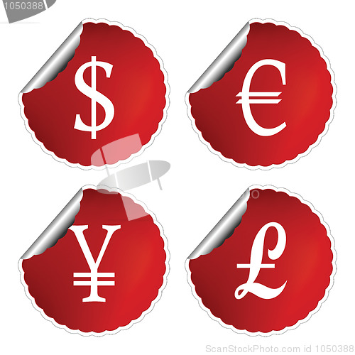 Image of red labels with international currency symbols