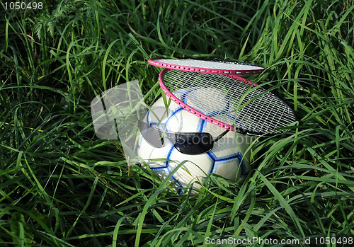 Image of Two Badminton Rackets and Soccer Ball