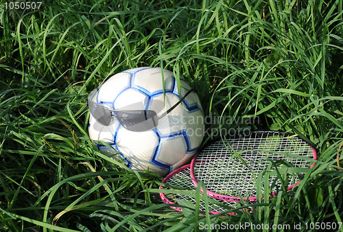 Image of Two Rackets, Soccer Ball and Sunglasses