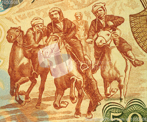 Image of Horsemen Competing at Buzkashi 