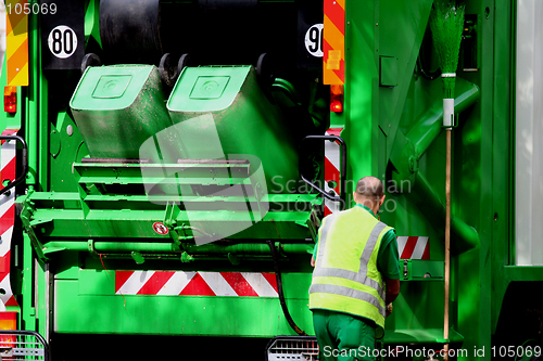 Image of Garbage truck and worker