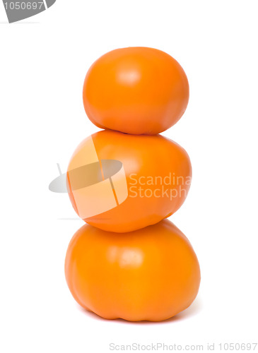 Image of Three orange tomato.