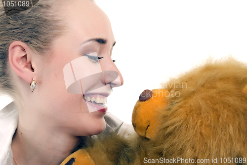 Image of Young woman with teddy bear  