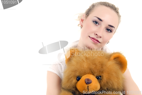 Image of Young woman with teddy bear  