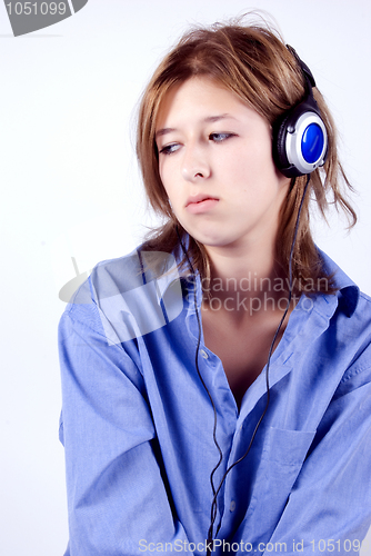 Image of Young girl in headphones   