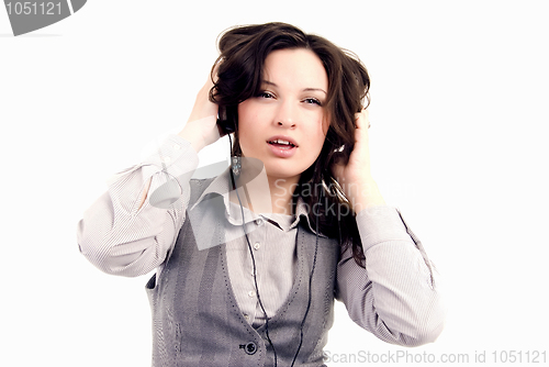 Image of Young girl in headphones   