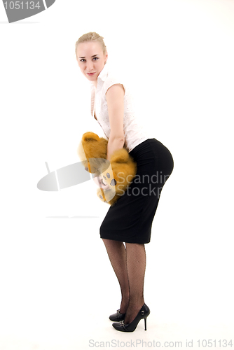 Image of Young woman with teddy bear  