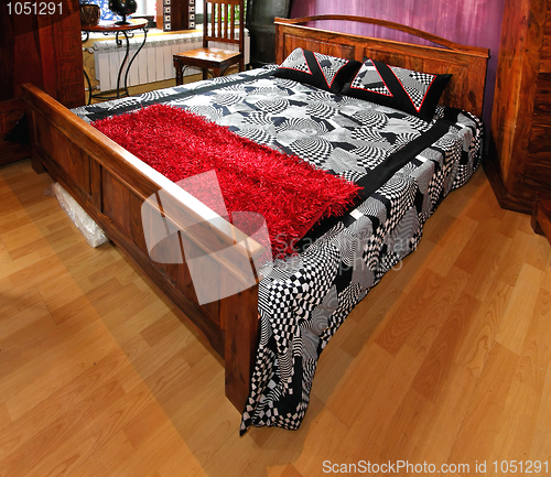 Image of Wooden bed