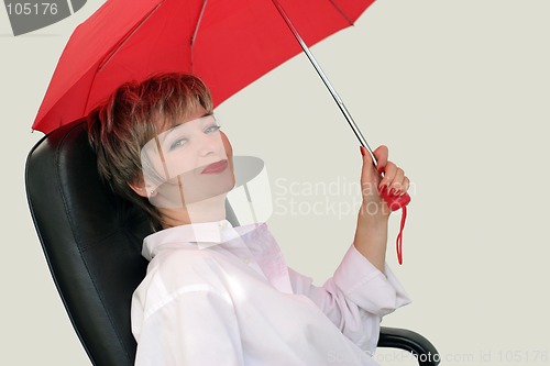 Image of Businesswoman with a red umbrella
