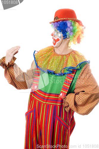 Image of Clown speaks with his hand