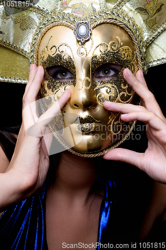 Image of girl in a Venetian mask
