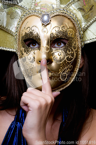 Image of Young woman in a Venetian mask
