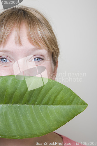 Image of Woman and Leaf