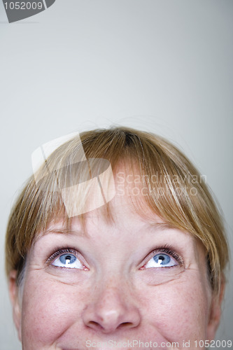 Image of Woman Looking Up