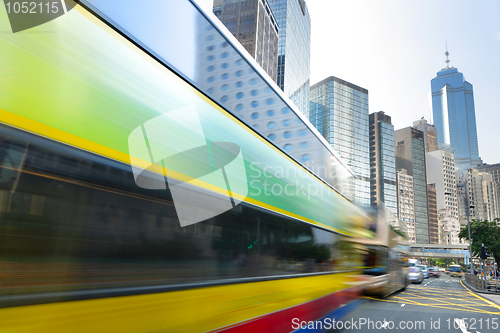 Image of Bus speeding through the street