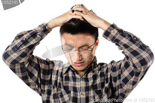 Image of Worried man having headache